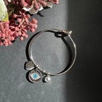 Charm Around evil eye bangle in premium tarnish-free metal, side view, Kharze Zarka
