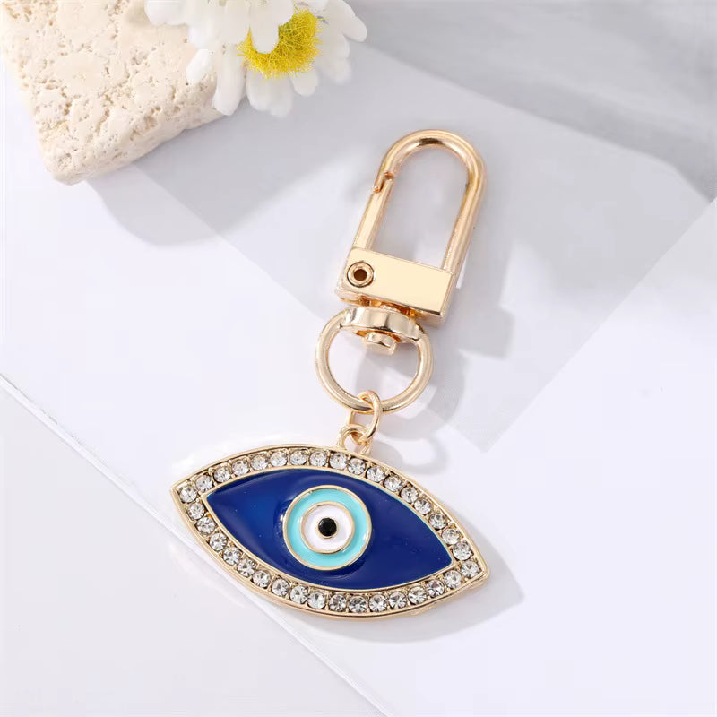 Glow and Shine evil eye bag charm, view 5, Kharze Zarka