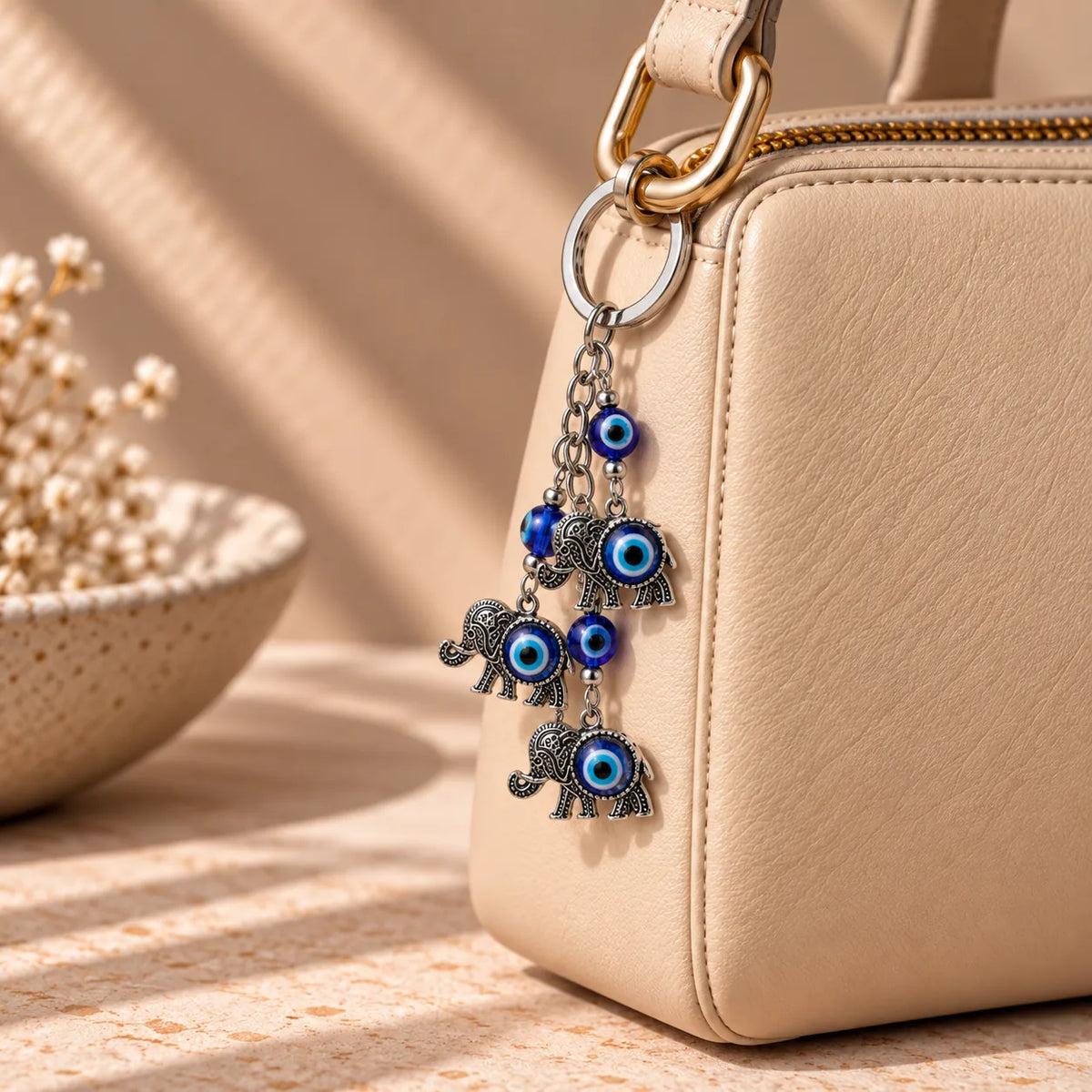 Lucky Steps elephant evil eye keychain, styled view, Kharze Zarka