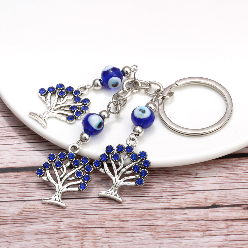 Rooted in Luck evil eye keychain, view 2, Kharze Zarka