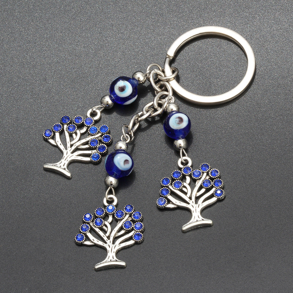 Rooted in Luck evil eye keychain, view 3, Kharze Zarka