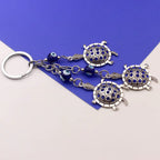 Shell Yeah evil eye keychain, view 2, Kharze Zarka