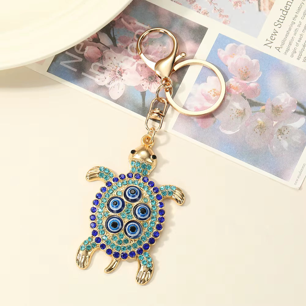 Protected in my Shell evil eye keychain, view 4, Kharze Zarka