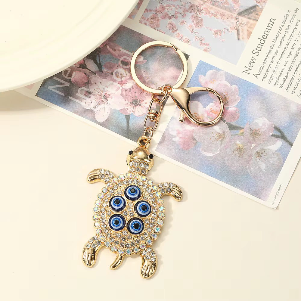 Protected in my Shell evil eye keychain, view 3, Kharze Zarka